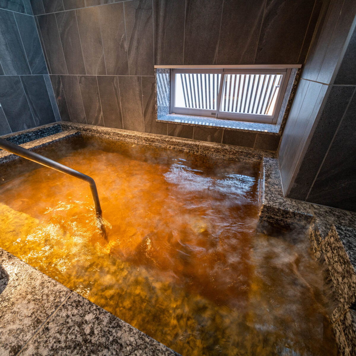 スーパーホテル山形・さくらんぼ東根駅前 天然温泉 桜桃の湯 photo